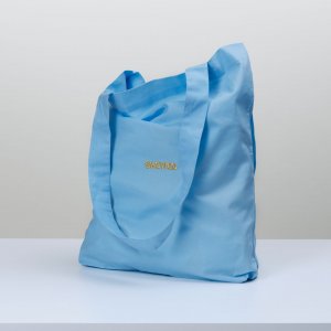 Stuffed light blue totebag with gold embroidered skewed logo